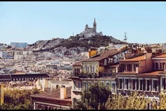 Marseille Airport with Mediterranean coastline, Provence lavender fields, luxury transfer vehicles, Calanques limestone cliffs backdrop, premium airport transportation service