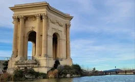 Montpellier Airport with Mediterranean beaches, Camargue wildlife, luxury transfer vehicles, Languedoc vineyards backdrop, premium airport transportation service