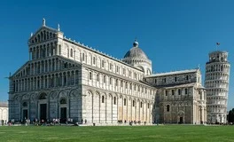 Pisa Airport with Leaning Tower, Tuscan architecture, coastal landscapes, Italian Riviera, luxury transfer vehicles, cultural heritage backdrop