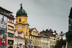 Rijeka port city with Austro-Hungarian buildings, Trsat Castle fortress overlooking Kvarner Bay, Opatija elegant promenade with Habsburg villas, Krk Bridge concrete arch, Kvarner islands, fresh scampi seafood, Učka mountain backdrop, palm trees waterfront, medieval towers